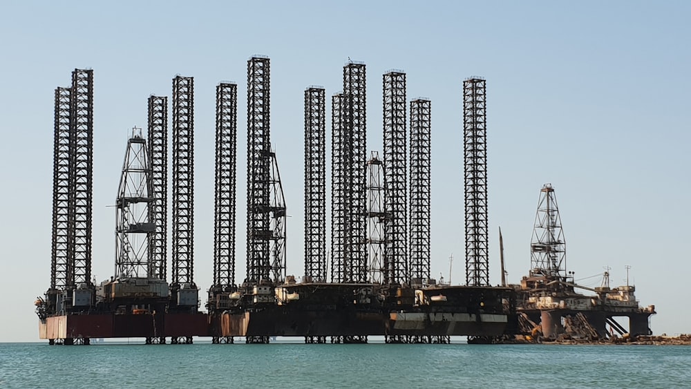 a large oil rig sitting on top of a large body of water