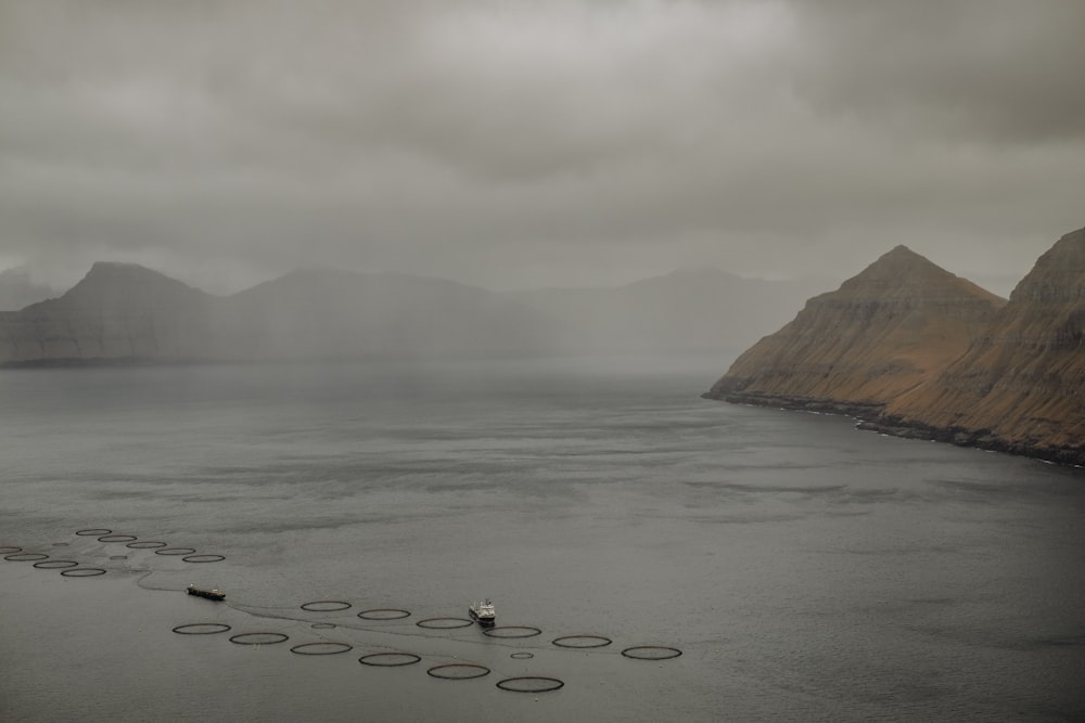 a large body of water surrounded by mountains