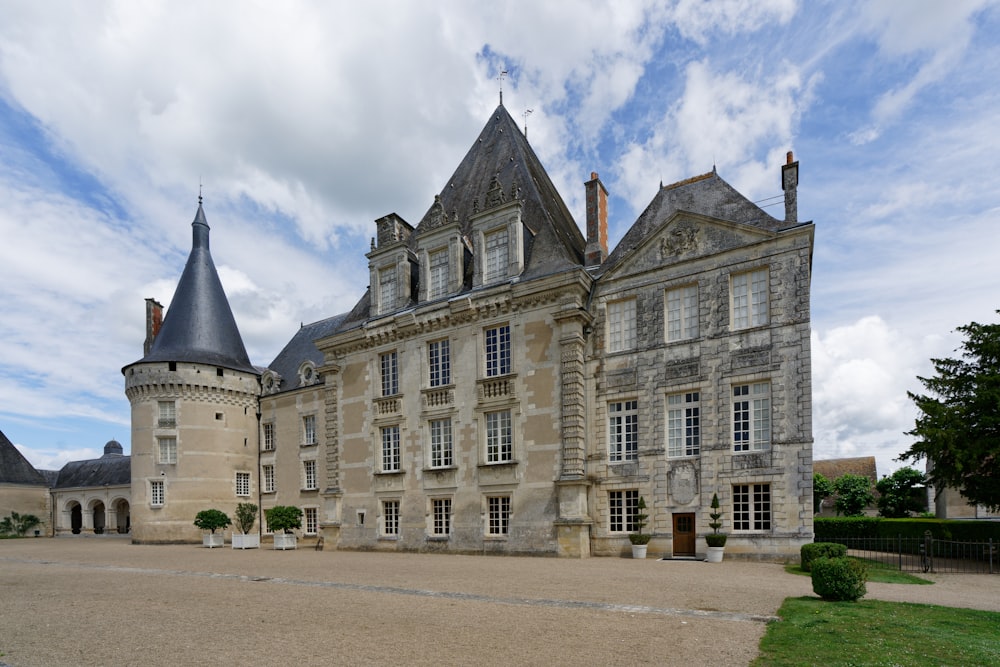 a large castle like building with a clock tower