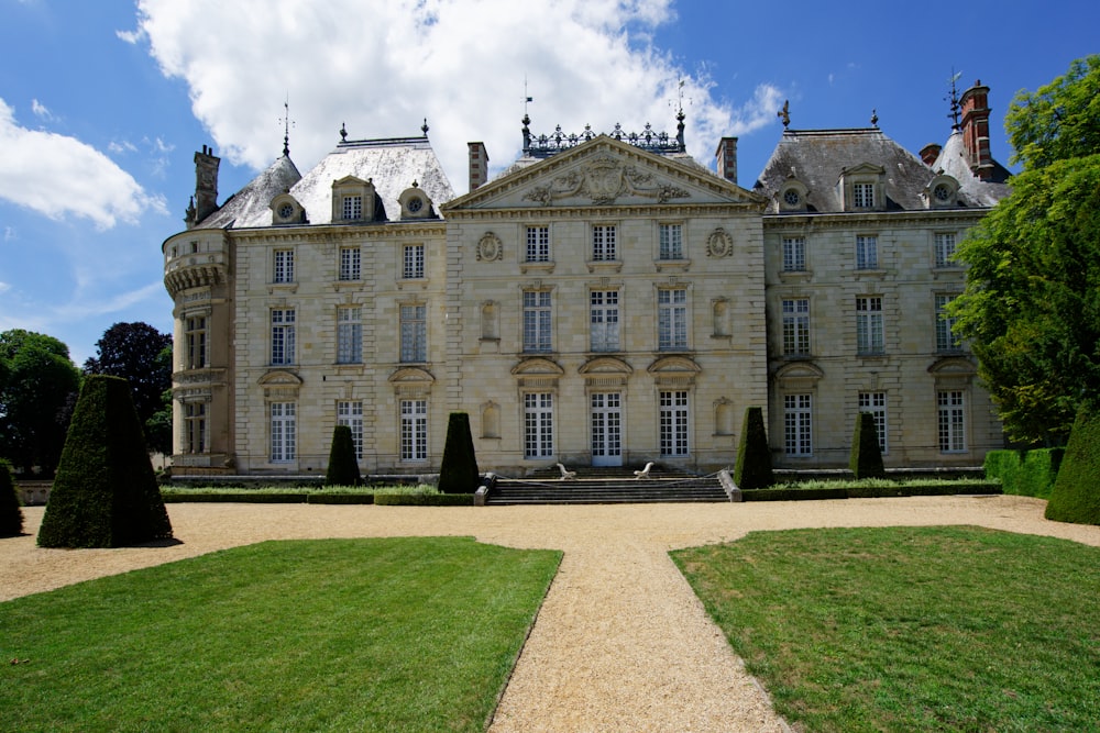 a large stone building with a lot of windows