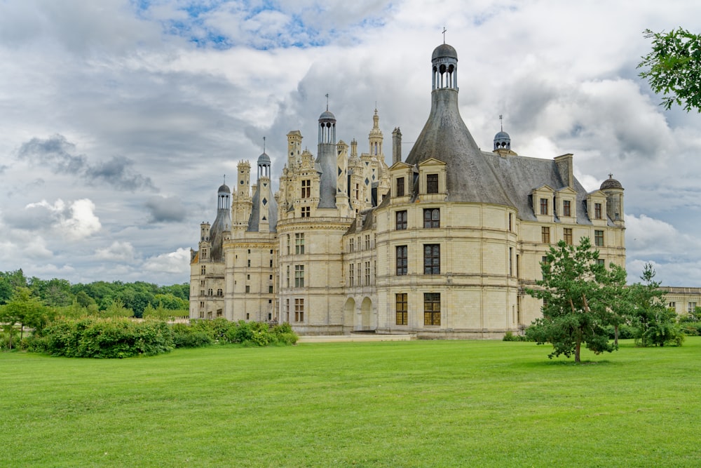 a large castle like building with a clock tower