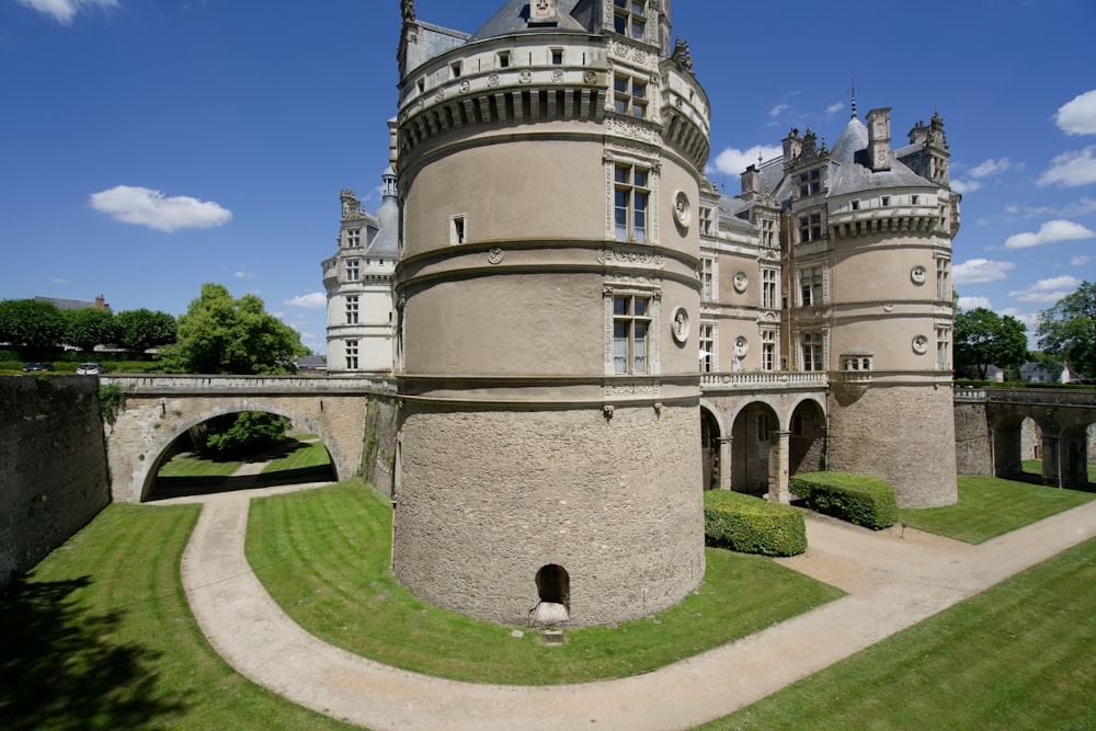 a castle like building with a walkway leading to it