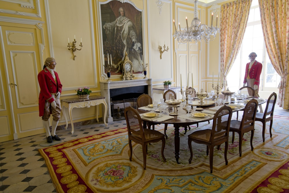 a dining room with a table and chairs