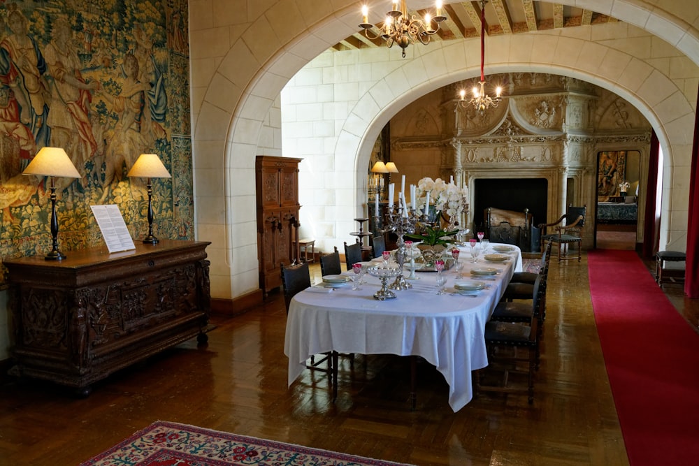 a dining room with a table and chairs