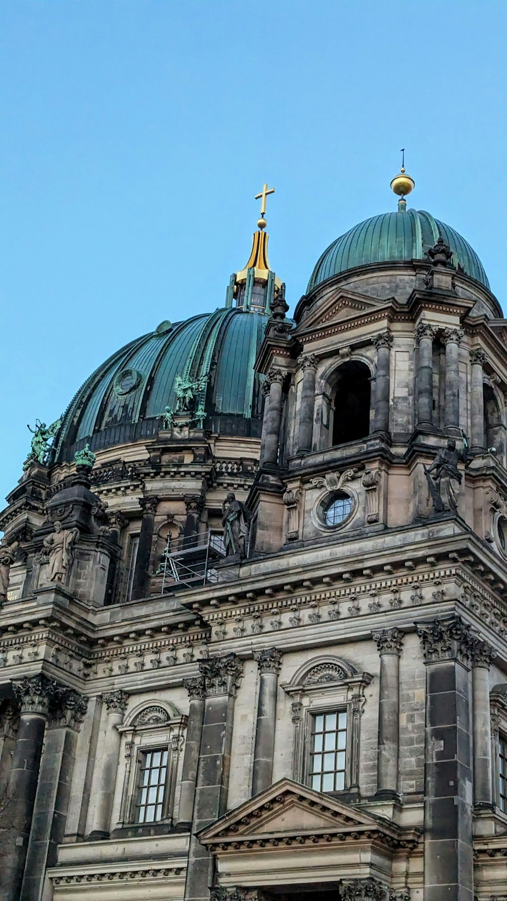 a large building with a clock on the top of it