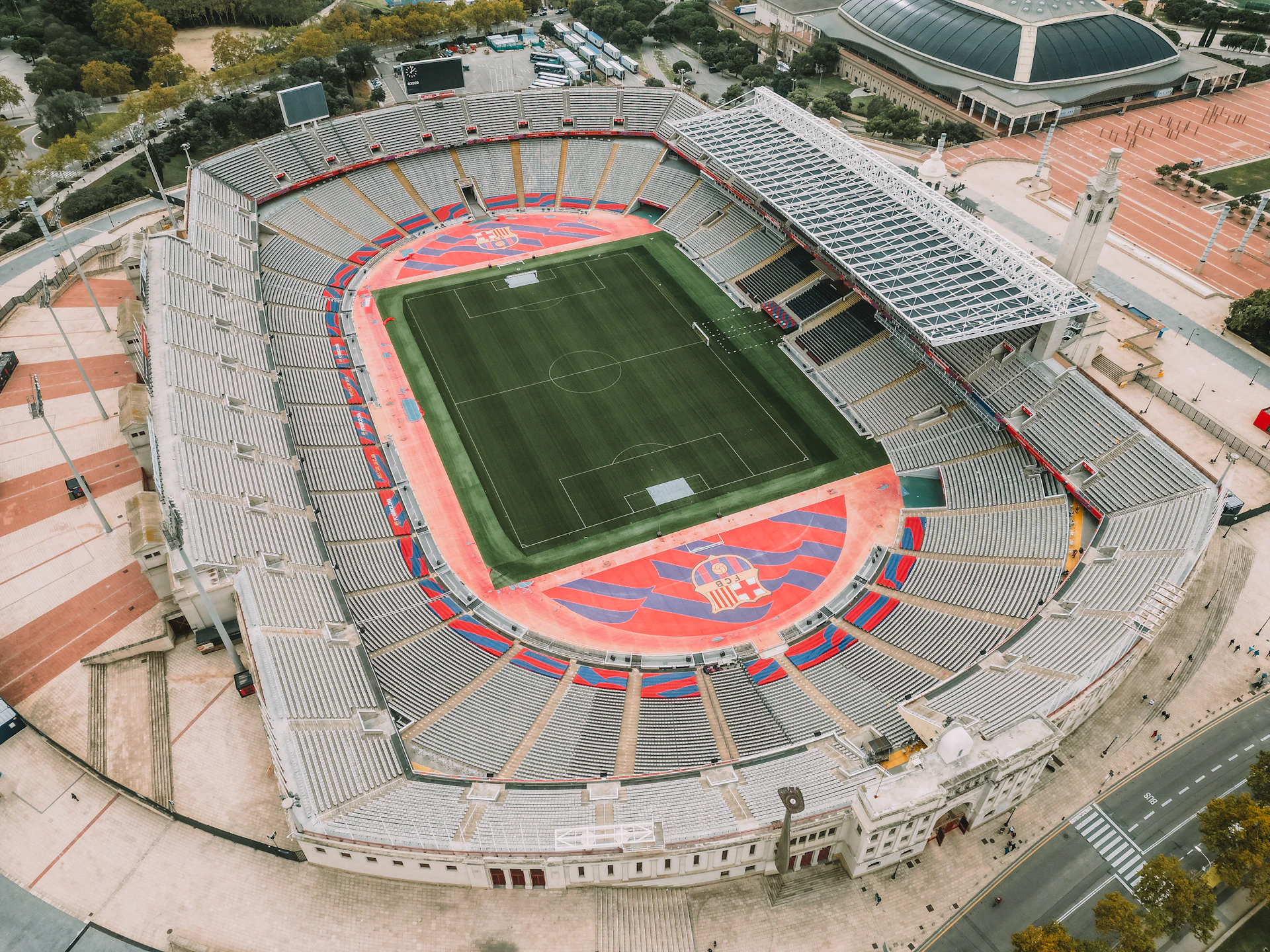 an aerial view of a stadium with a soccer field