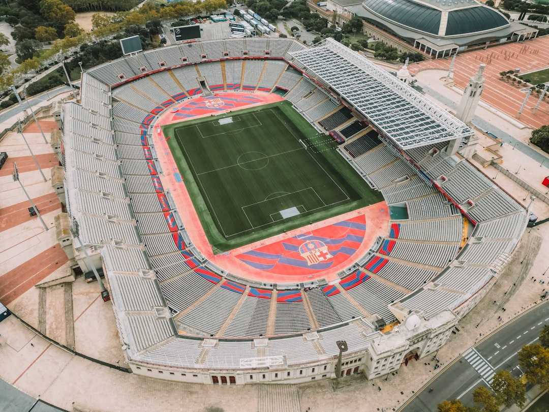 an aerial view of a stadium with a soccer field
