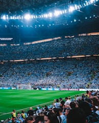 a stadium full of people watching a soccer game