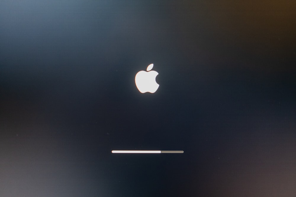 an apple logo is shown on a black background