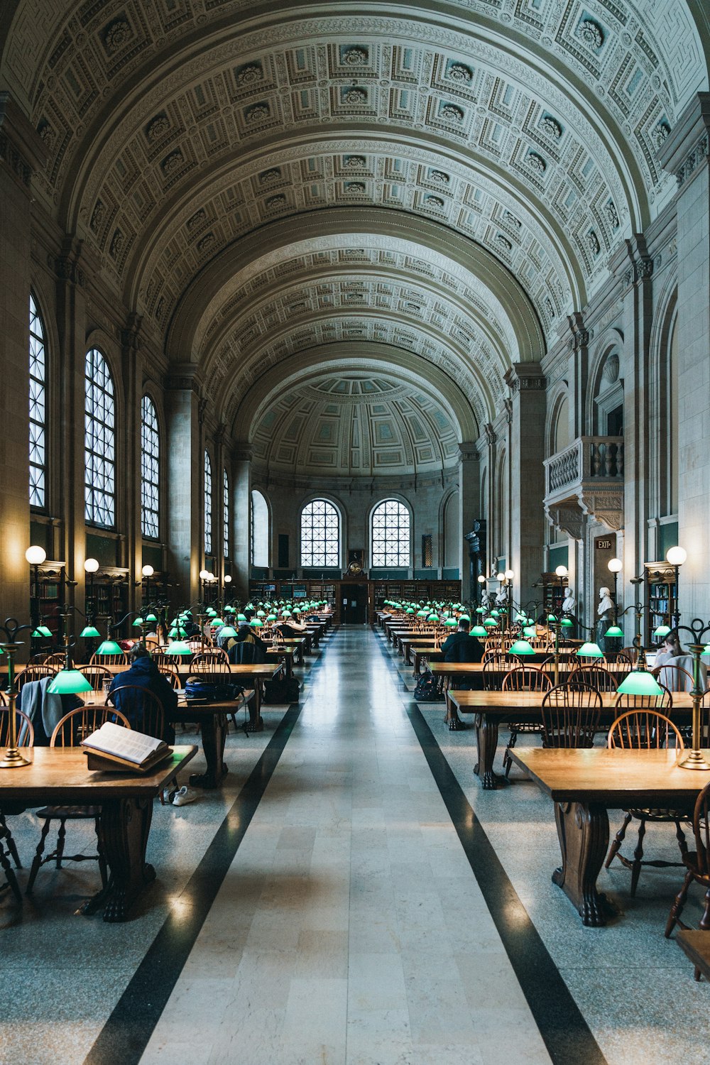 a large room with tables and chairs in it