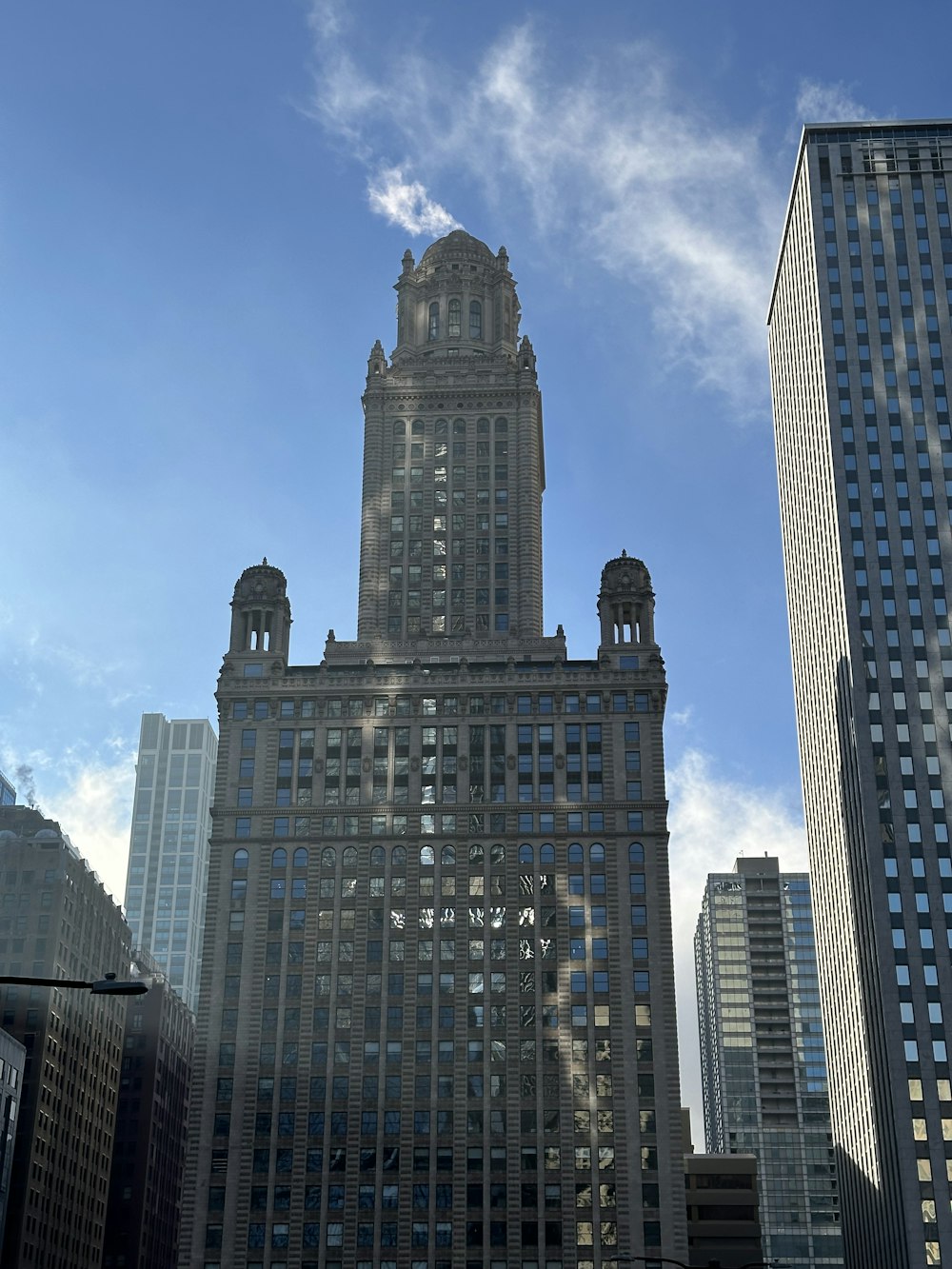 a very tall building with a clock on it's side