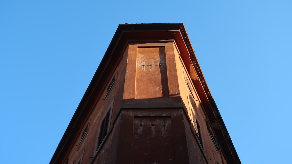 a tall building with a clock on the top of it