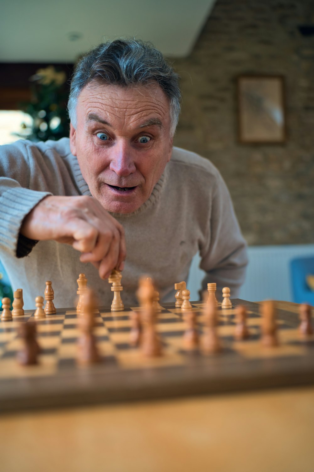 a man is playing a game of chess