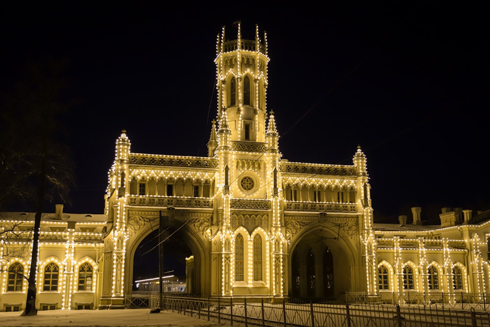 a large building with lights on it at night