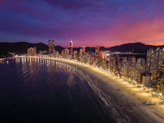 an aerial view of a city at night