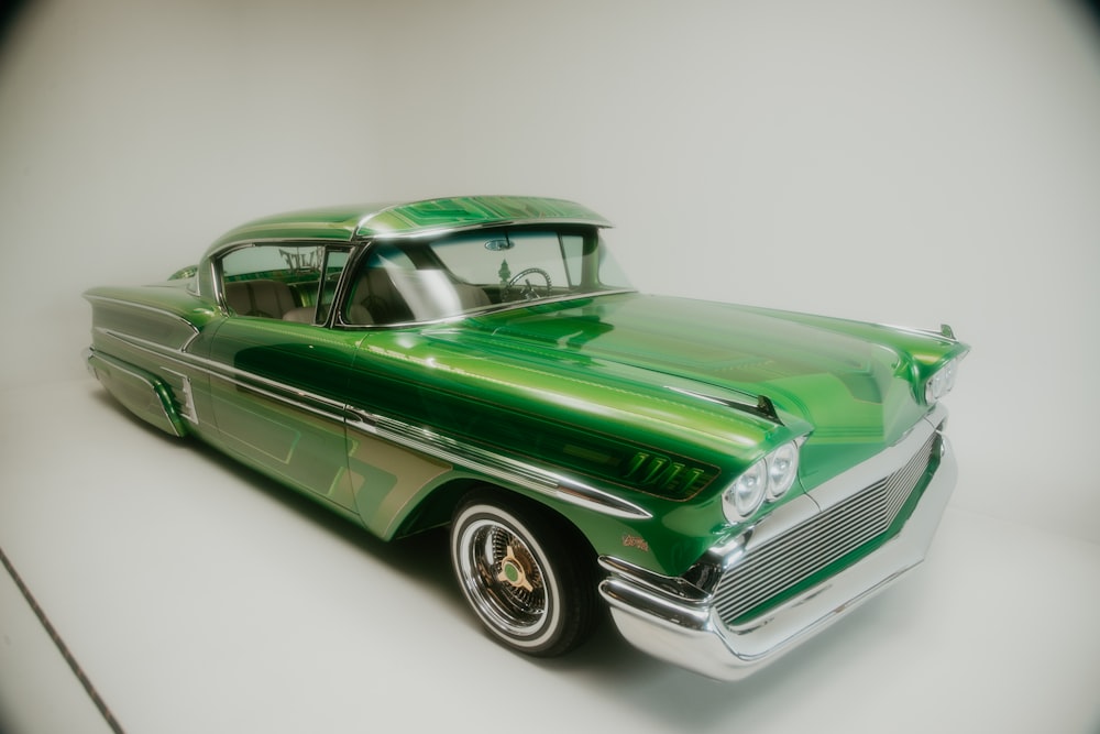 a green and white car on a white background