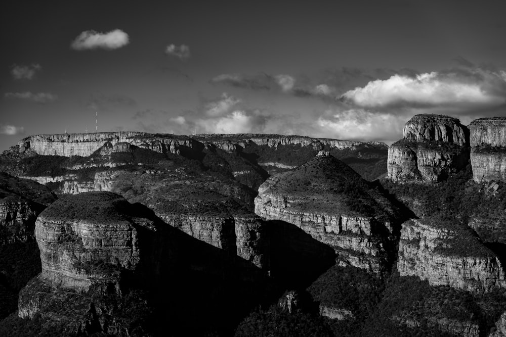 a black and white photo of the grand canyon