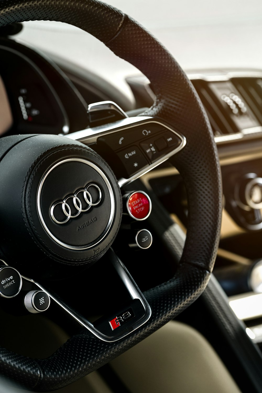 a steering wheel and dashboard of a car