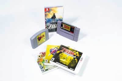 a nintendo game system with several games on it