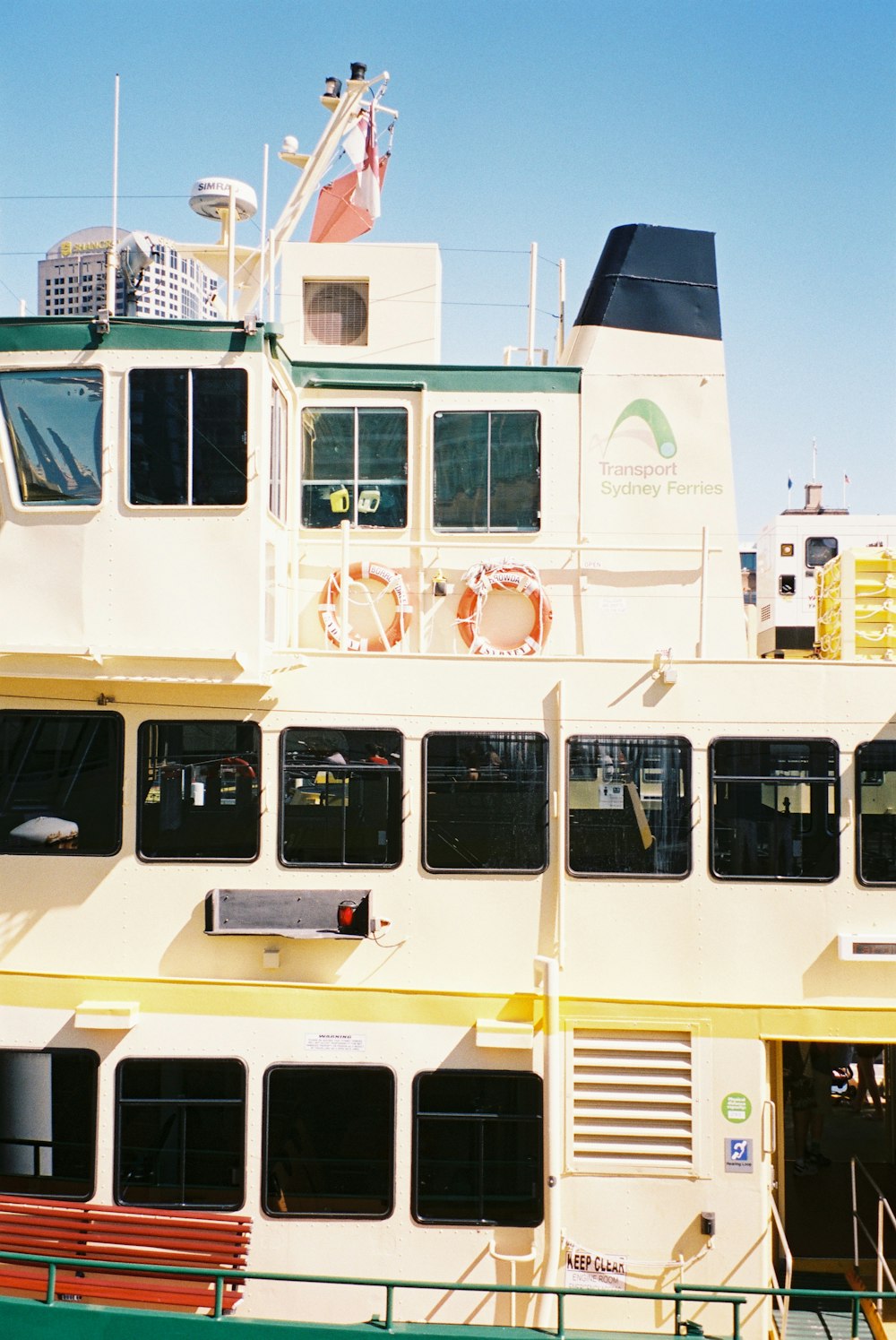 a large white boat sitting next to a dock