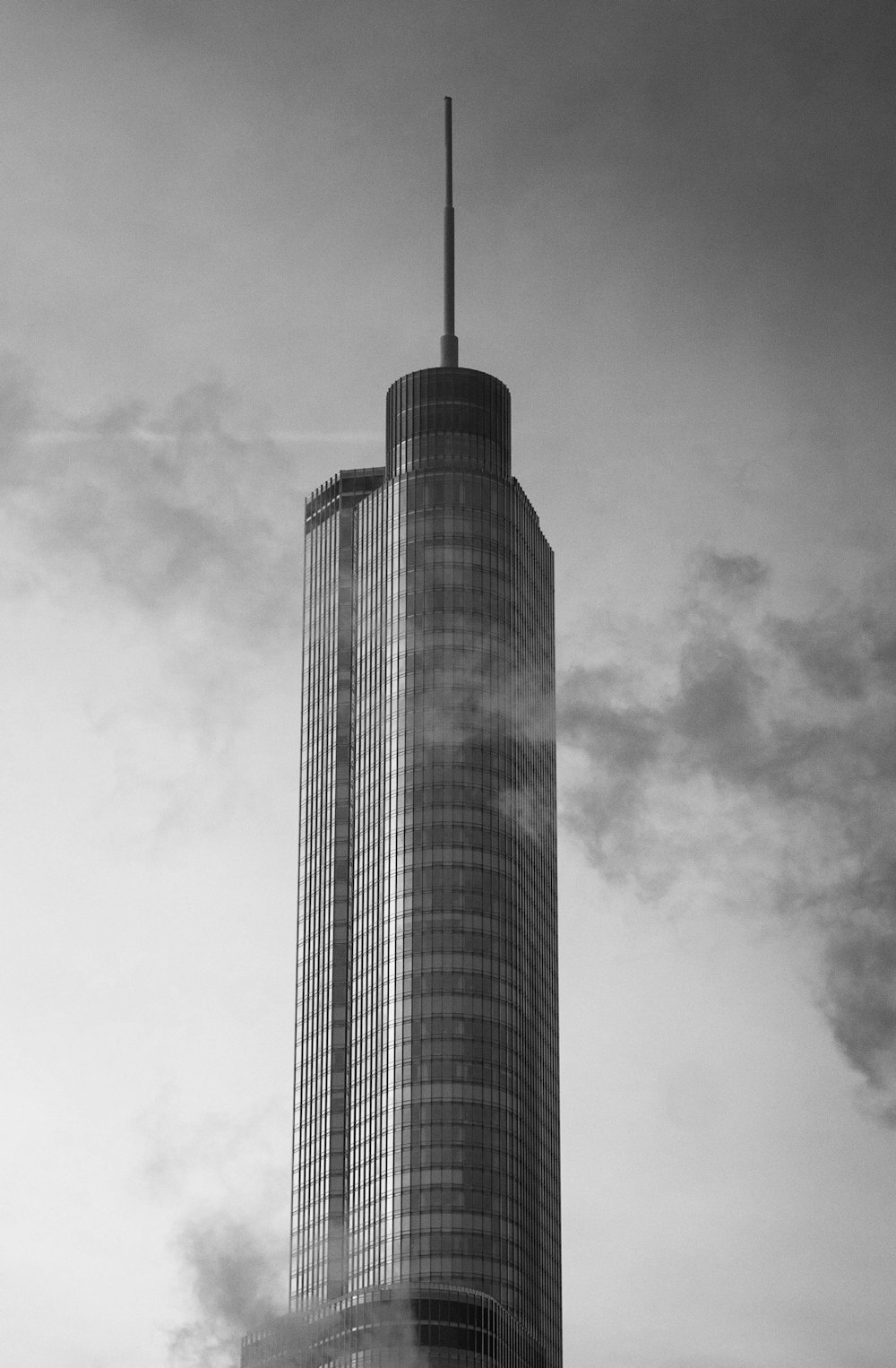 a very tall building with a sky background