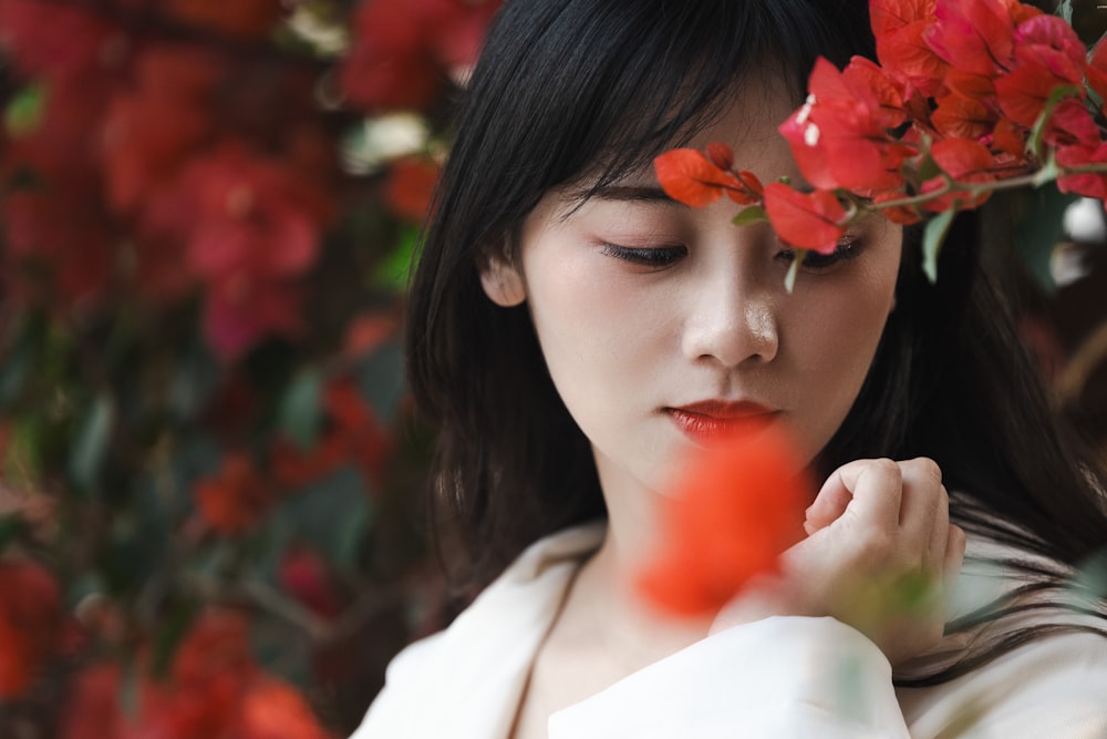 a woman with a flower in her hair