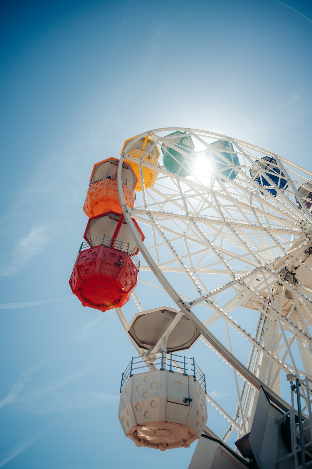 a ferris wheel with a blue sky in the background