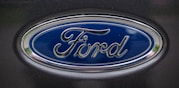 a close up of a ford emblem on a car