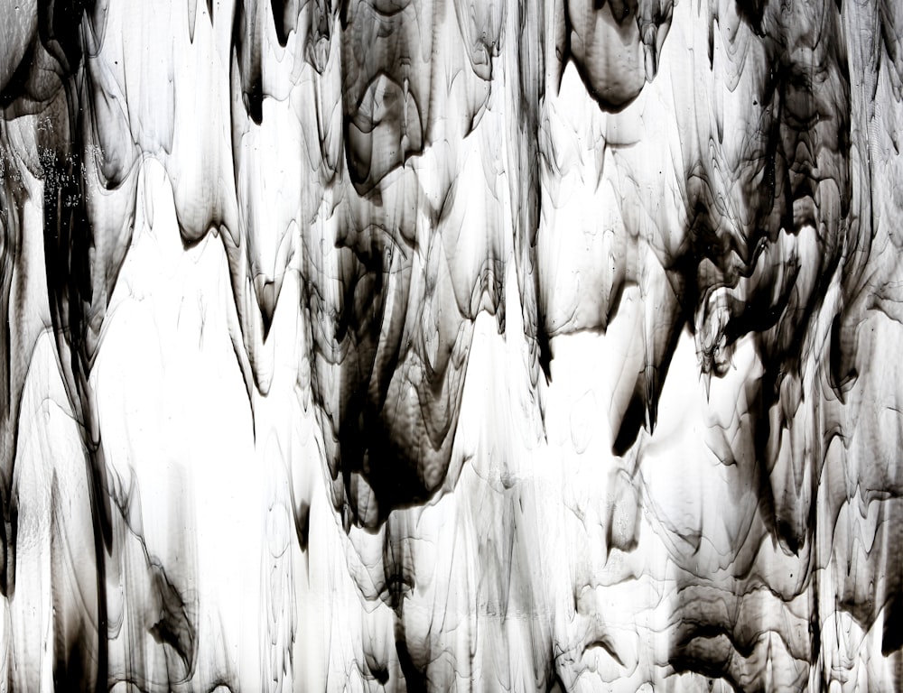 a black and white photo of ice formations