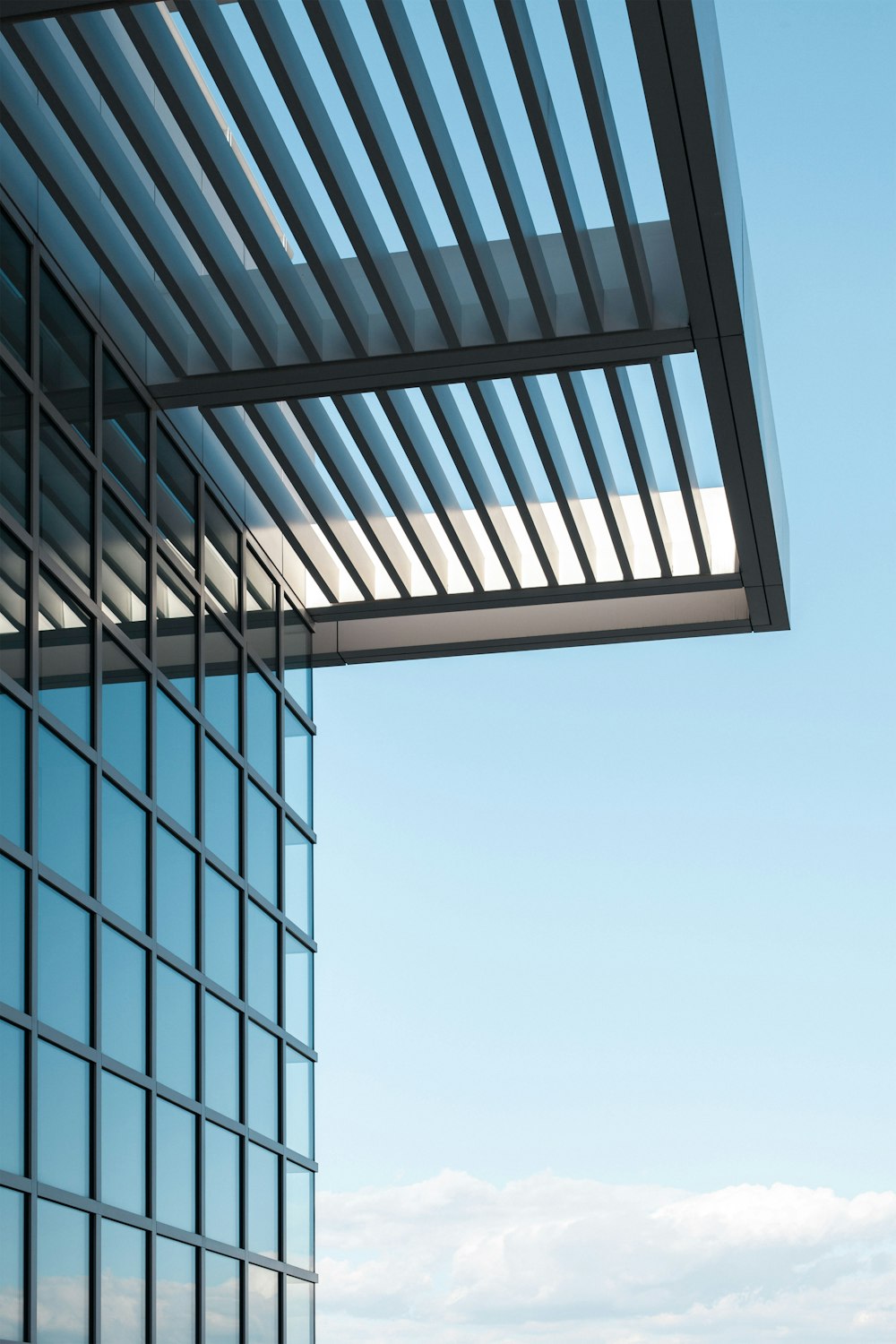 a tall building with a sky background