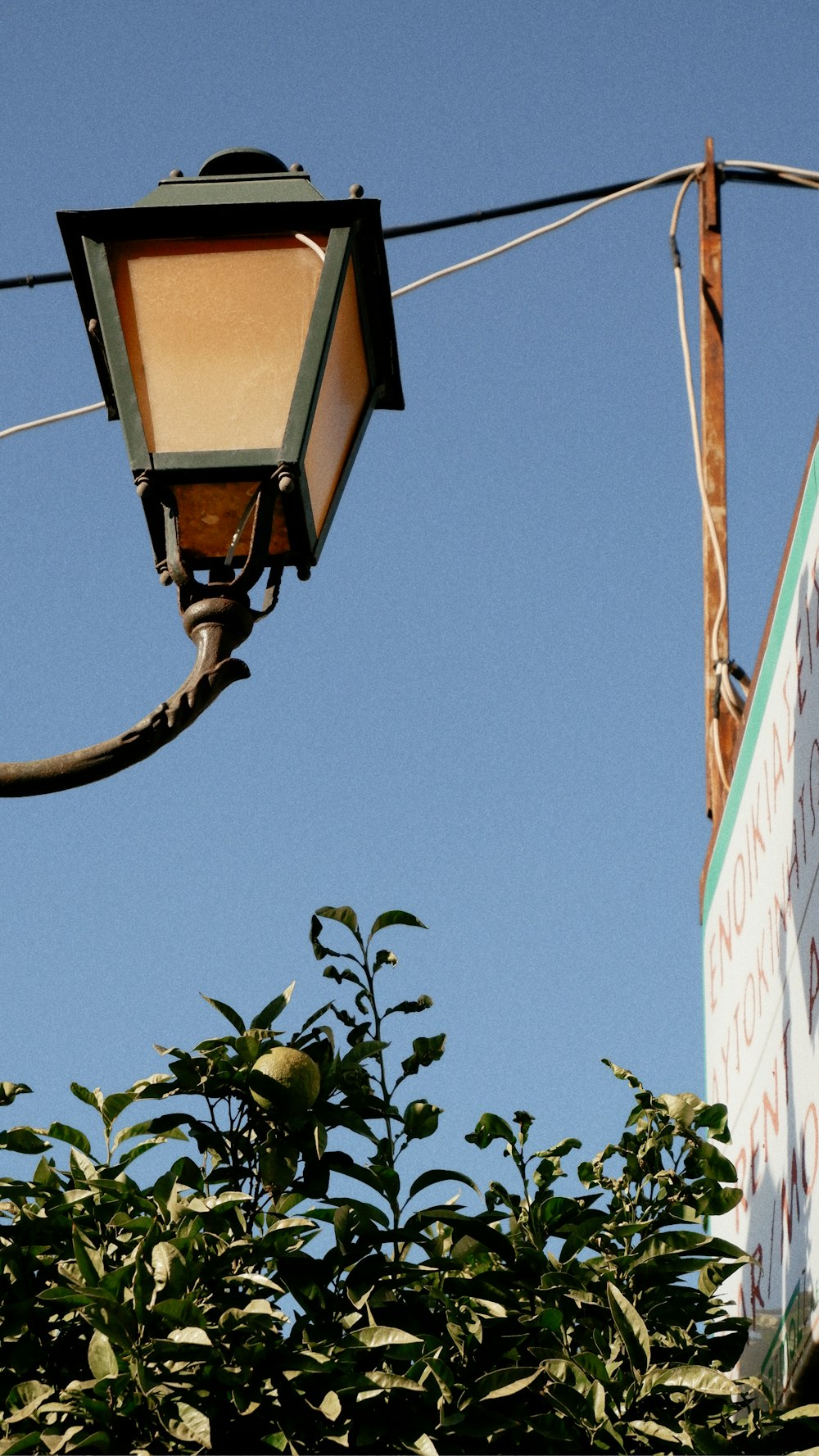 a street light hanging off the side of a building