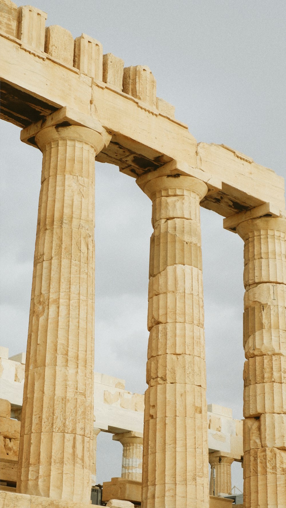 a couple of large stone pillars sitting next to each other