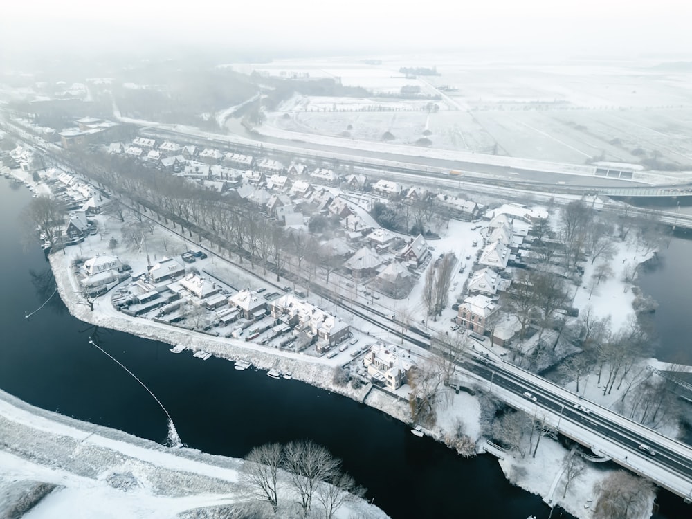 an aerial view of a snow covered city