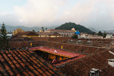 Tiled roofs of San Cristóbal with the highland mountains behind