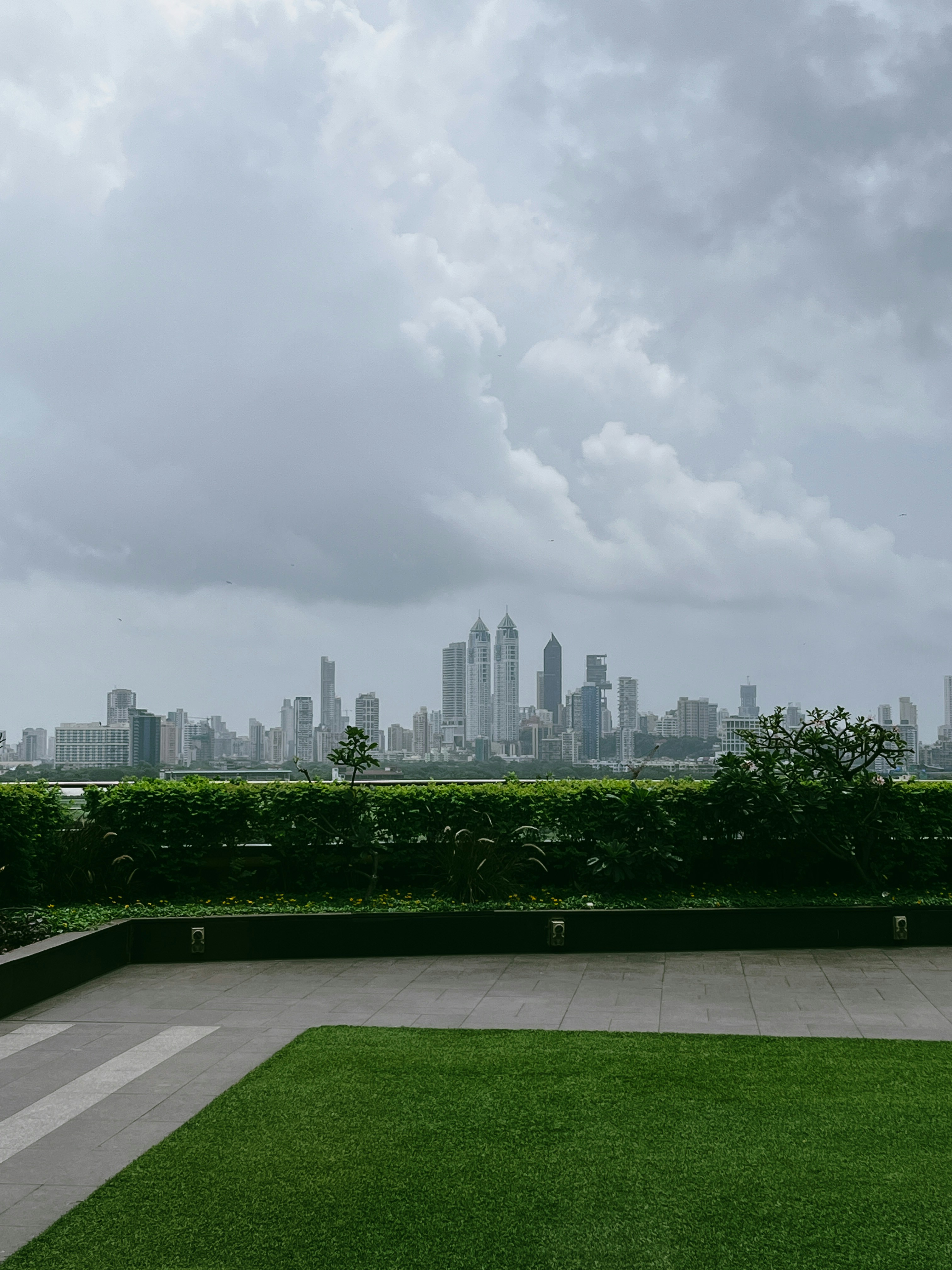a view of a city from a grassy area