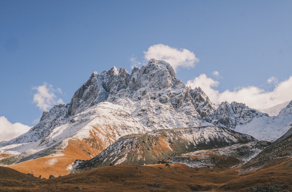 a mountain range with snow on the top