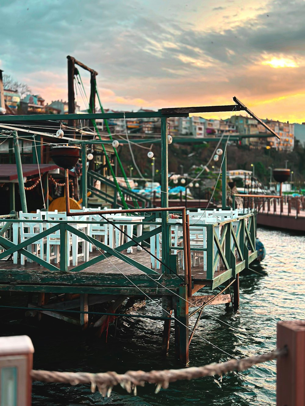 a dock with several boats in the water