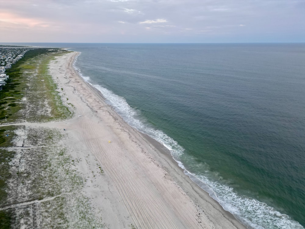 an aerial view of a beach and the ocean