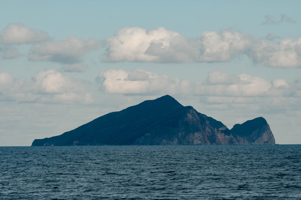 a small island in the middle of a large body of water