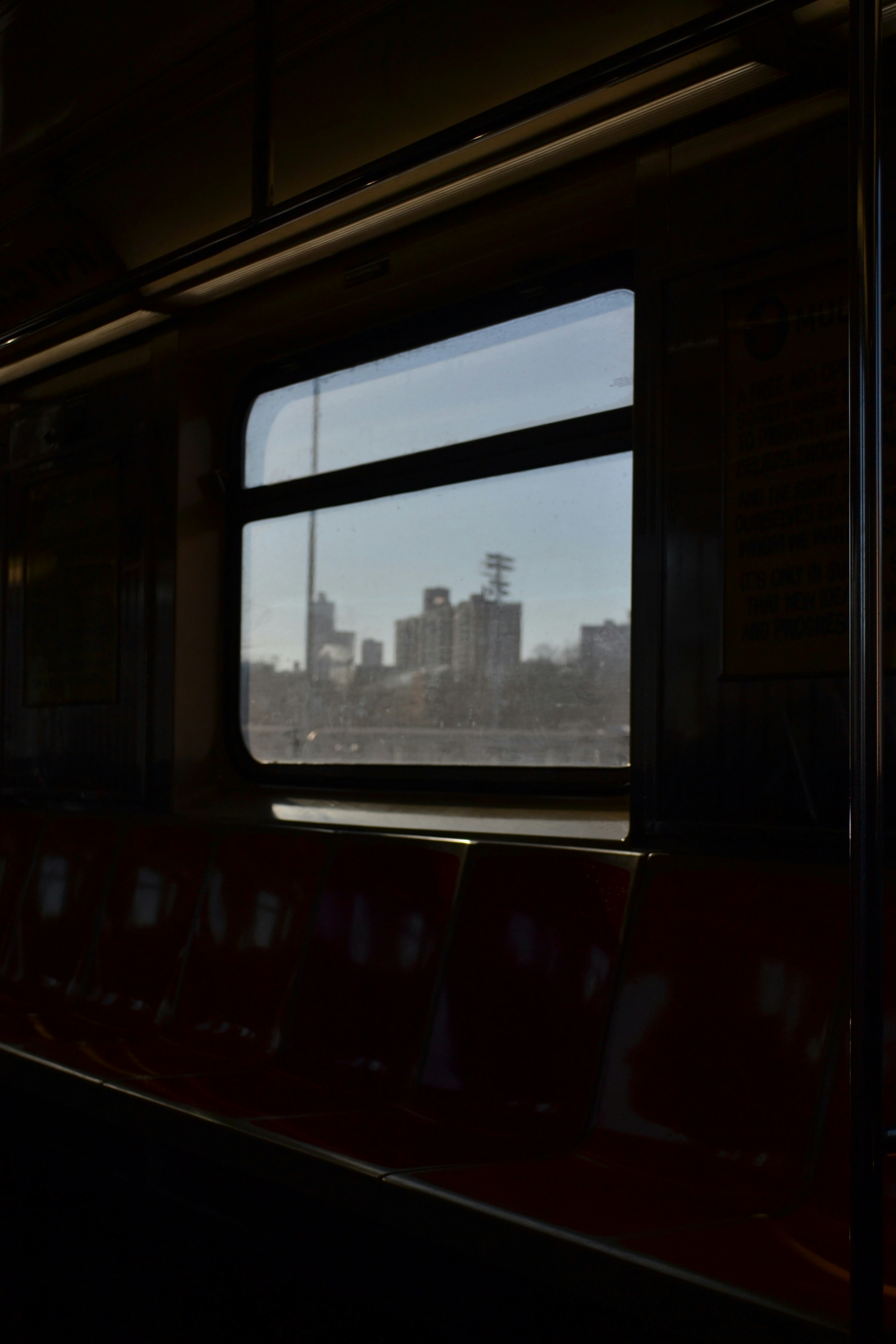 a view of a city from a train window