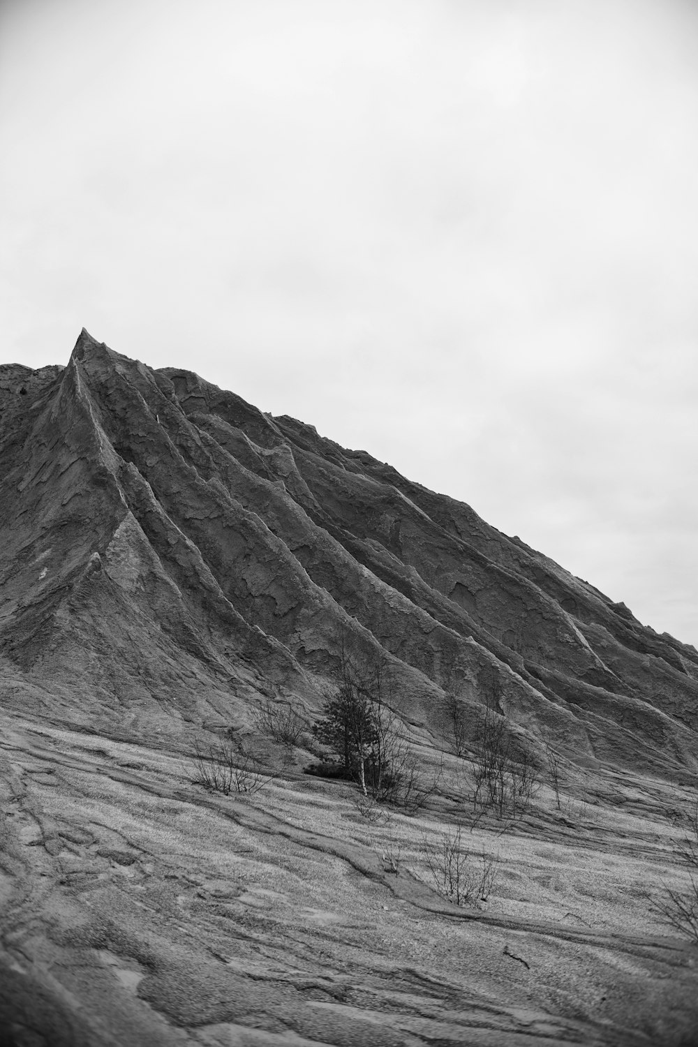 a black and white photo of a mountain