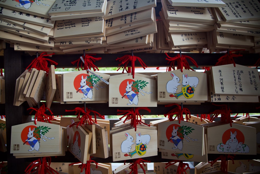 a bunch of wooden boxes hanging from a ceiling