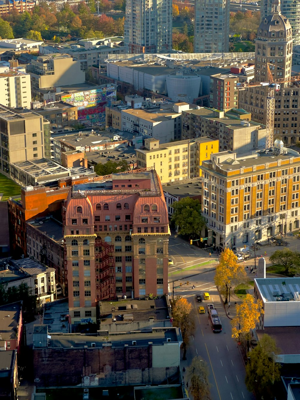 an aerial view of a city with tall buildings