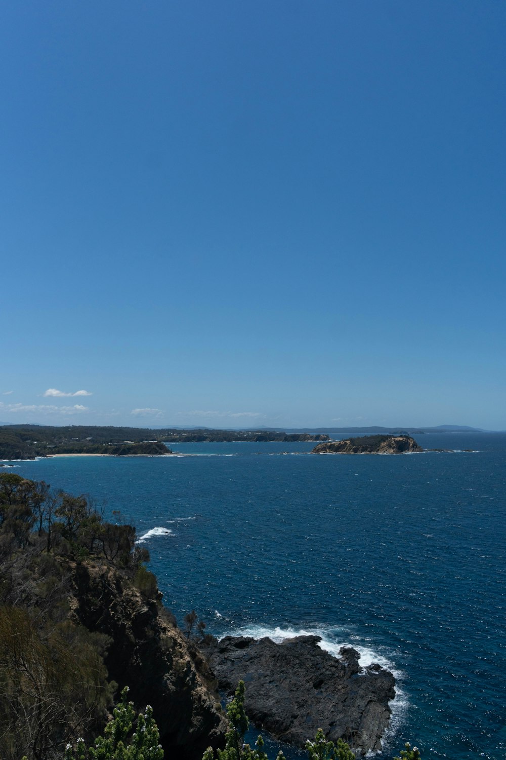 a view of the ocean from a cliff