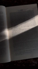 an open book sitting on top of a table