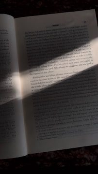 an open book sitting on top of a table