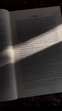 an open book sitting on top of a table