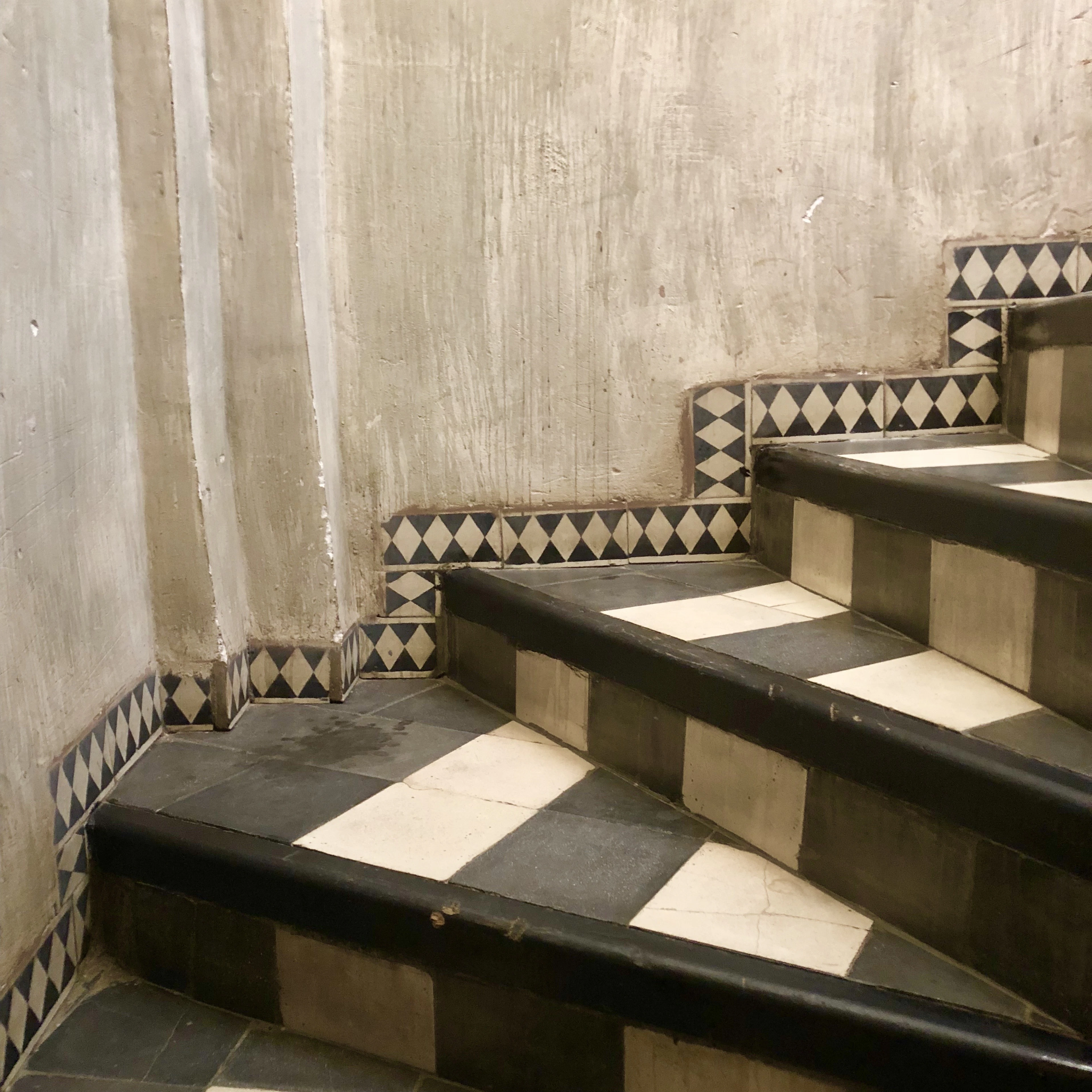 Black and white tiled stairs