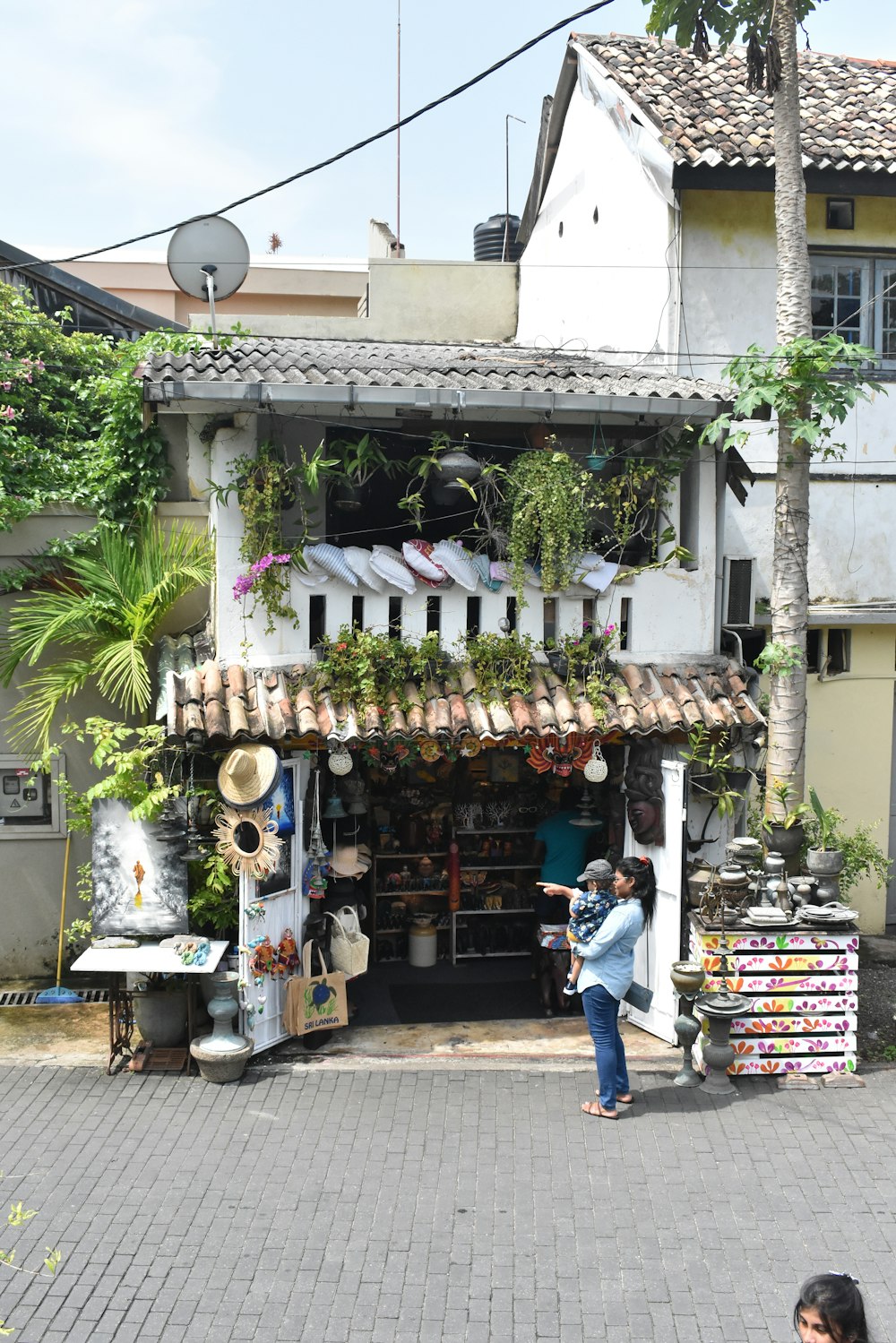 a woman standing in front of a store