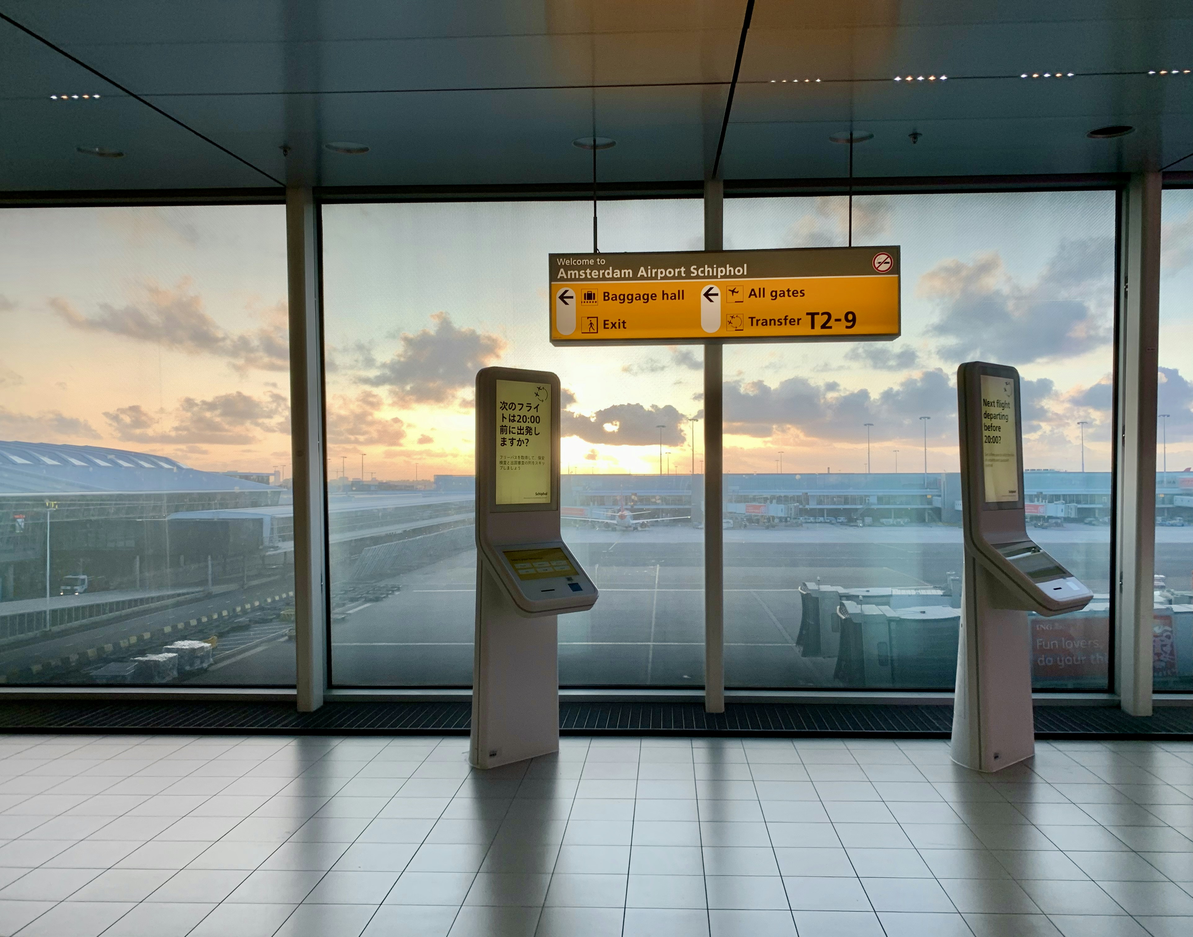 a couple of machines sitting in front of a window, 